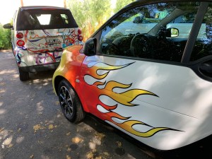 Katy Dickinson 2009 and 2017 SmartCars with wraps