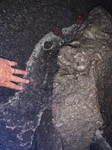 Katy with ice at Beauty Cave, Jessica, Beauty Cave - Craters of the Moon National Monument and Preserve, July 2019