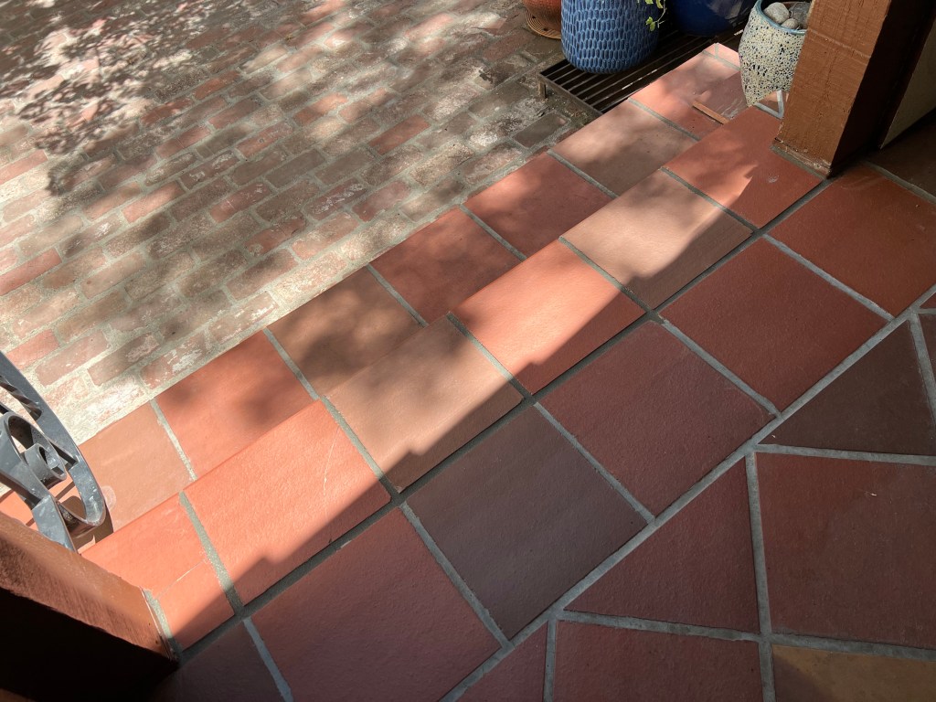 repaired side porch tiles, July 2022